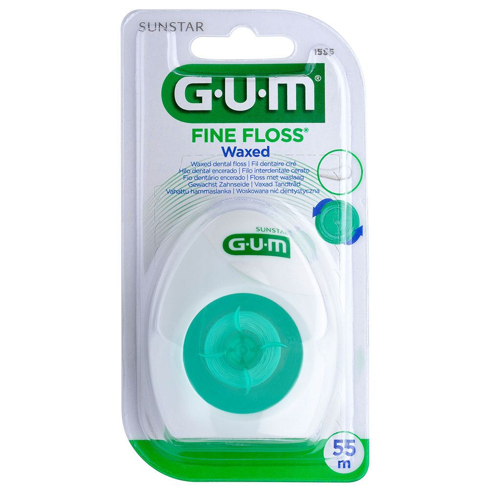 Zahnseide-Spender in Blisterverpackung. Weiß-grüner Spender, grüne Kappe. Text: G.U.M Fine Floss Waxed, 55 m.