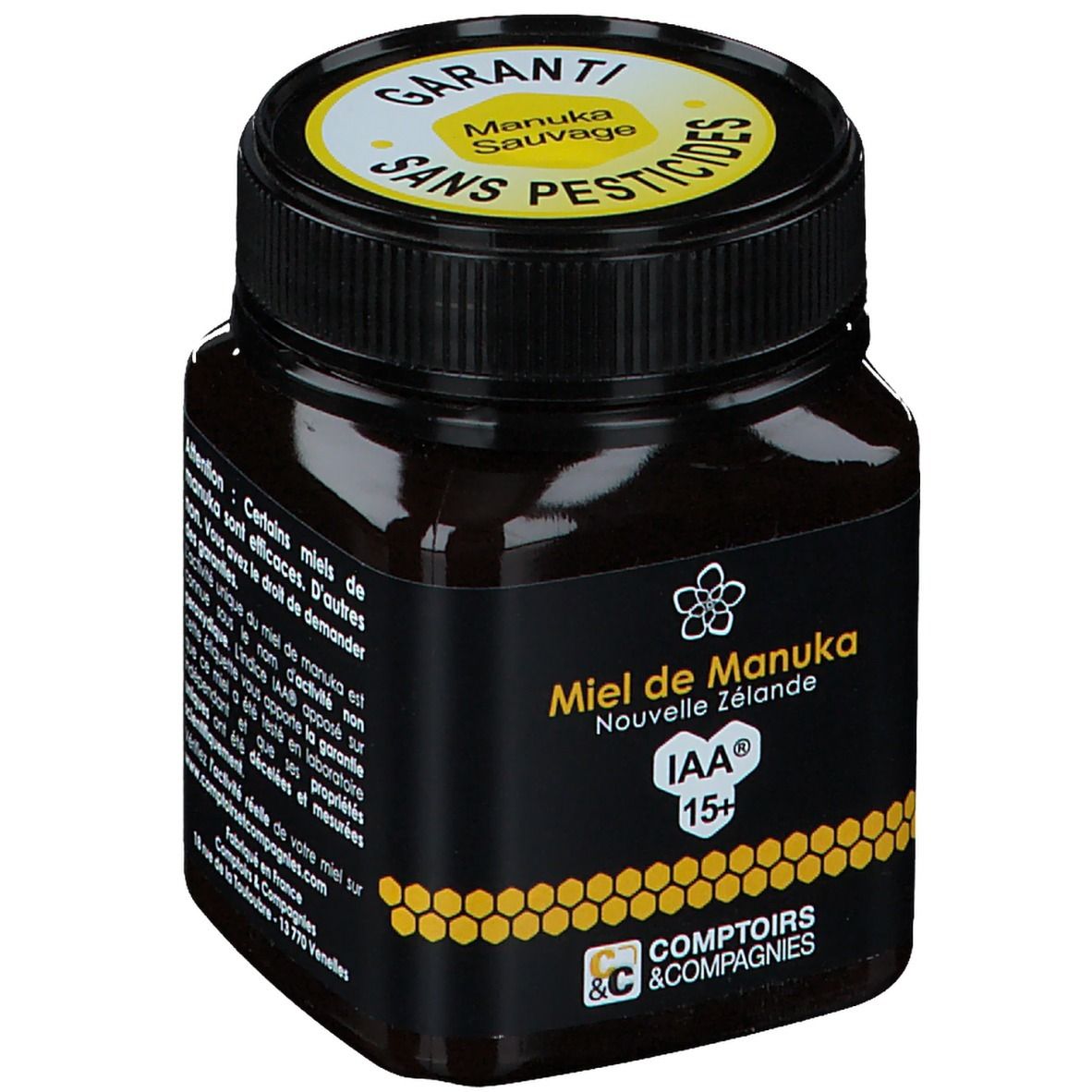 Pot de miel de Manuka. Étiquette noire avec texte jaune : Miel de Manuka Nouvelle Zélande IAA 15+. Couvercle avec garantie.