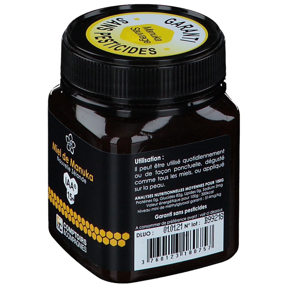 Pot de miel avec étiquette noire. Texte jaune : Miel de Manuka Nouvelle Zélande IAA 15+. Dos avec informations nutritionnelles et date limite.