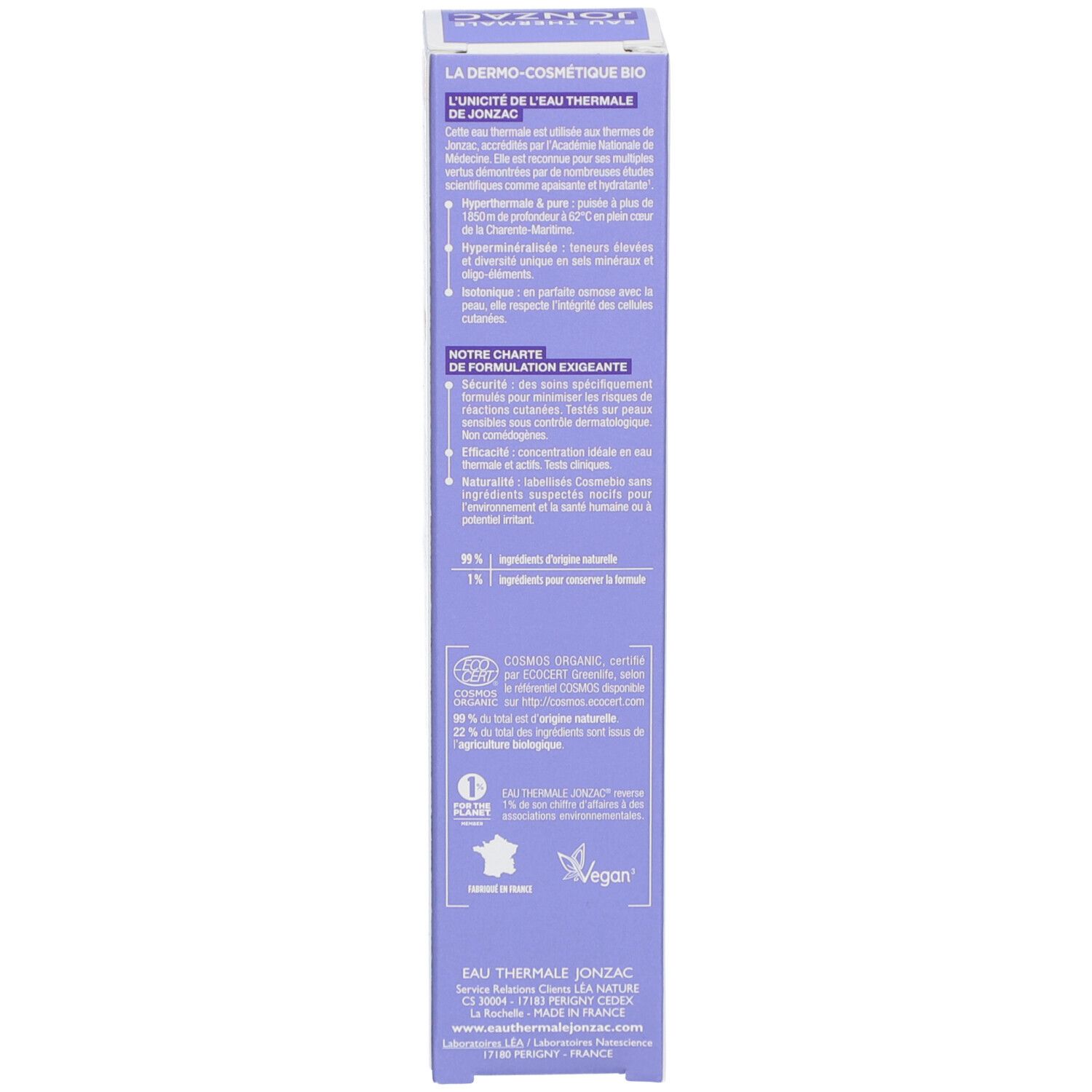 Côté de l'emballage carton. Texte multilingue. Contient des informations sur les ingrédients et l'utilisation.