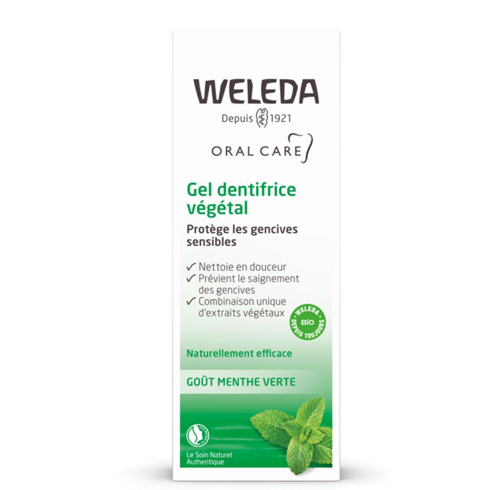 Tube de gel dentifrice Weleda. Emballage vert et blanc avec informations et label bio.