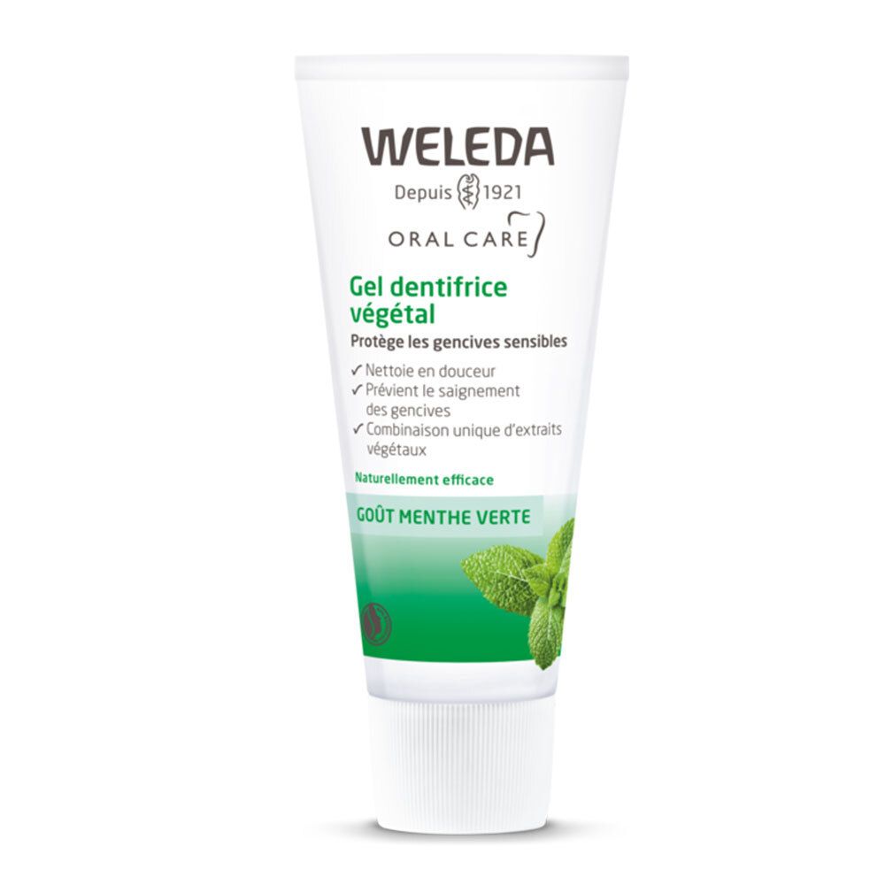Tube de gel dentifrice Weleda. Tube blanc avec impression verte et informations.