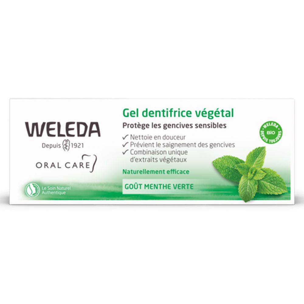 Emballage de gel dentifrice Weleda. Boîte verte et blanche avec informations et logo.