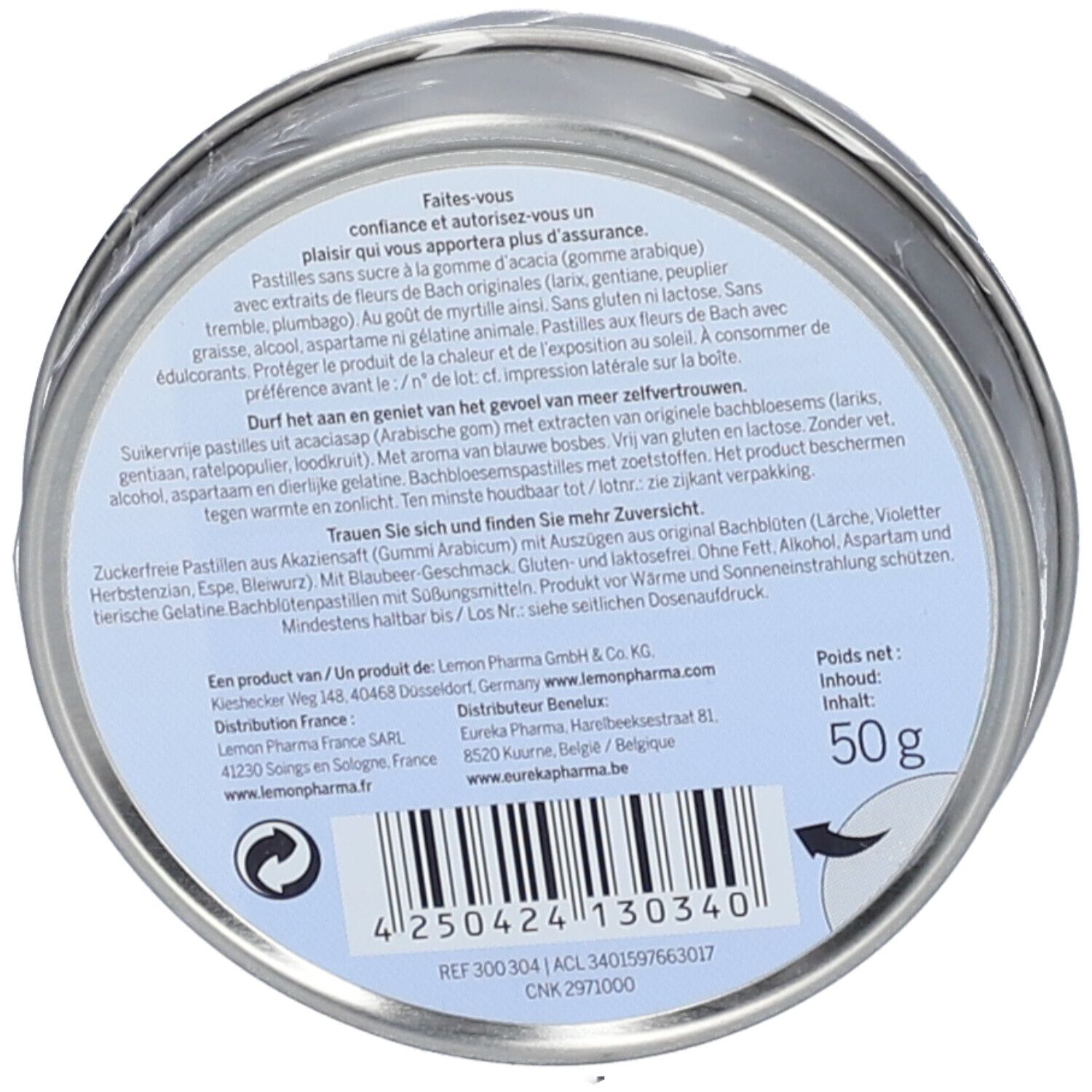 Dos de la boîte métallique. Texte multilingue. Contient des informations sur les ingrédients et le fabricant.