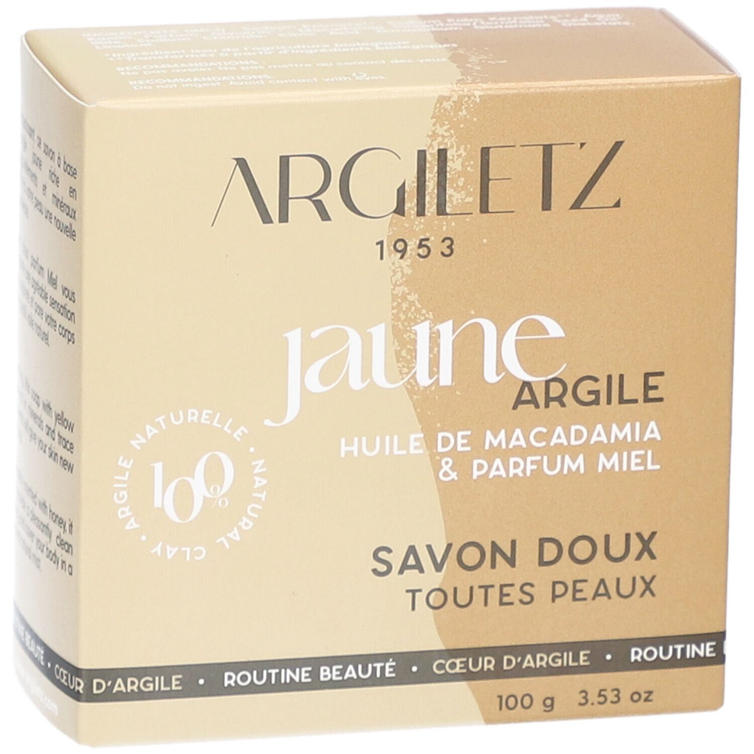 Kartonverpackung mit Produktinformationen. Aufschrift: Argiletz, jaune argile, huile de macadamia & parfum miel, Savon doux, toutes peaux.