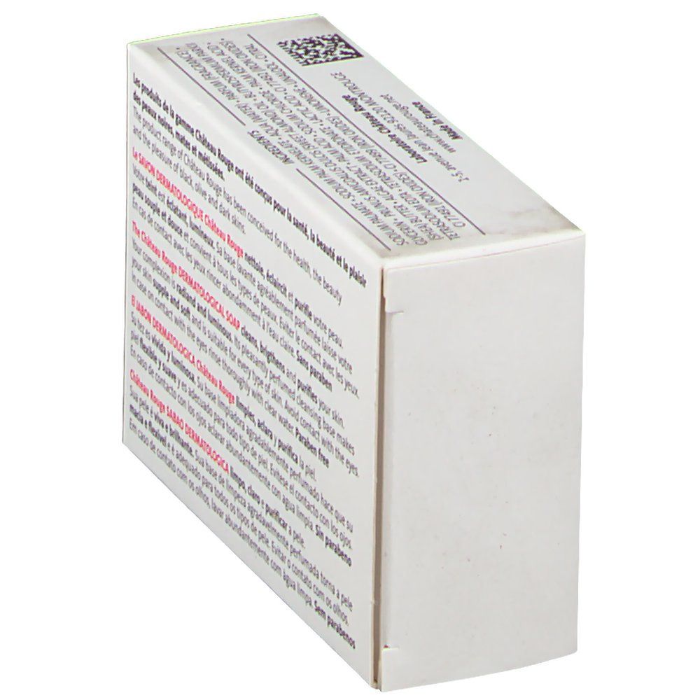 Schräg gestellte, weiße Verpackung. Rückseite mit Text in mehreren Sprachen. Produktname: SAVON DERMATOLOGIQUE.