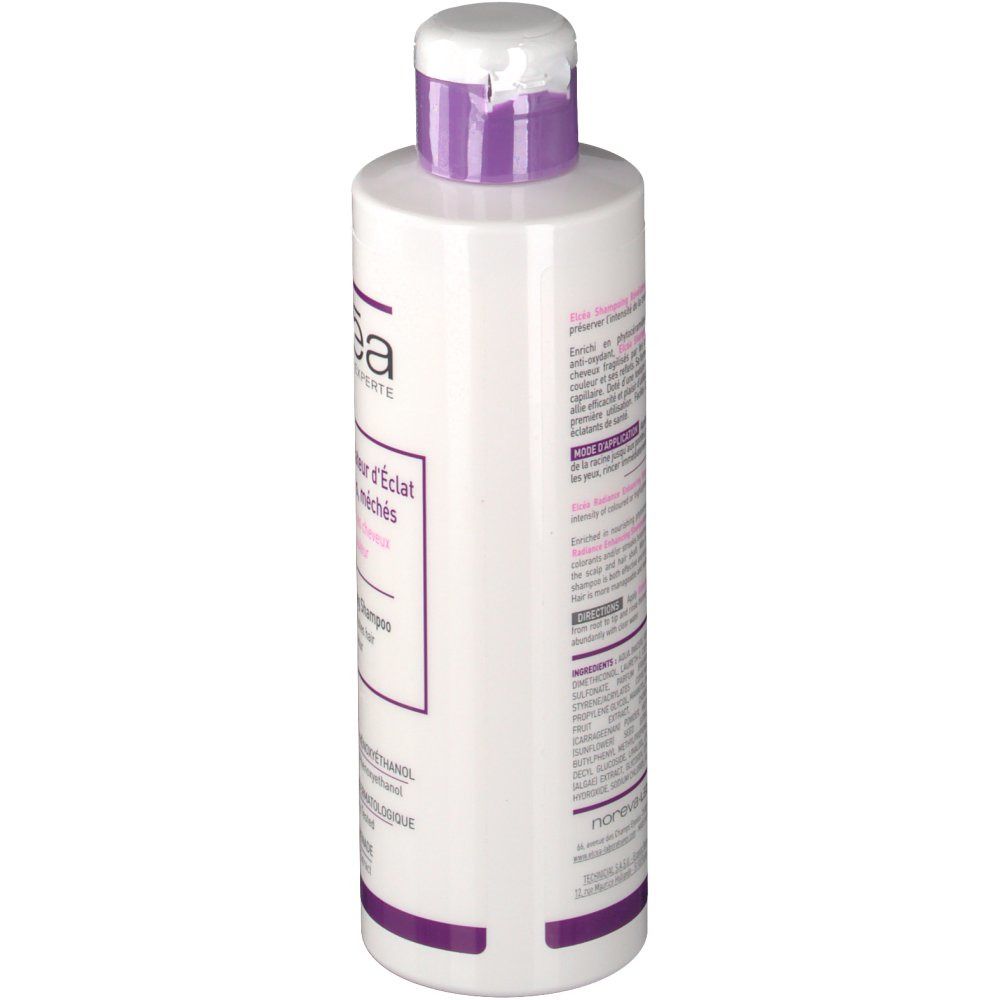 Flacon de shampooing Elcéa. Blanc, accents violets. Informations produit et ingrédients au dos.
