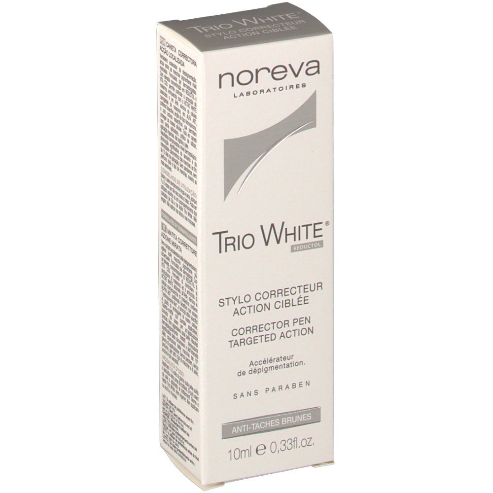 Boîte de correcteur. Blanche, accents gris. Marque Noreva Laboratoires. Nom Trio White. Texte: Stylo Correcteur Action Ciblée, 10ml.