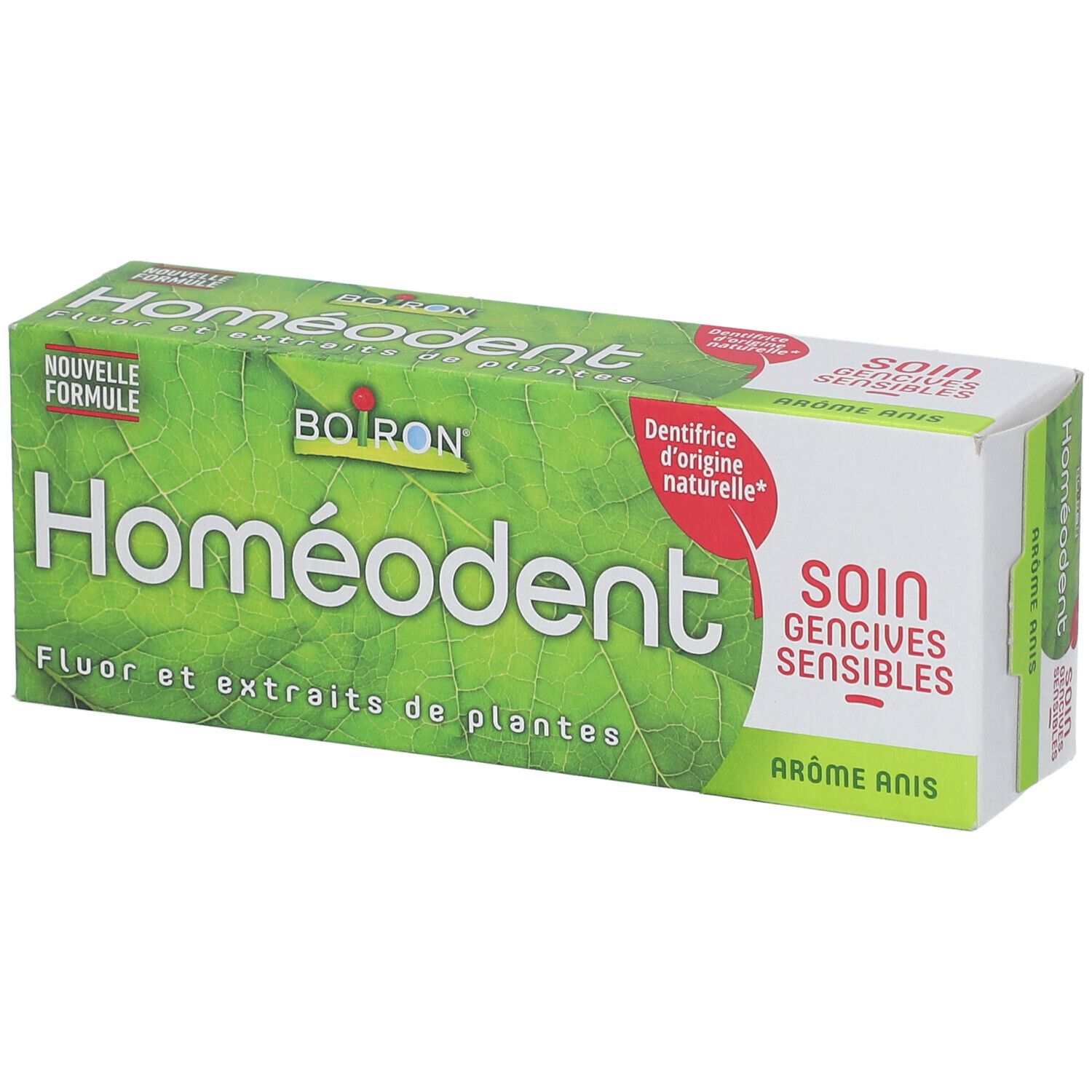 Zahncreme-Verpackung. Grün mit 'Homeodent' und 'Boiron' Logo. Text: 'Fluor et extraits de plantes'.