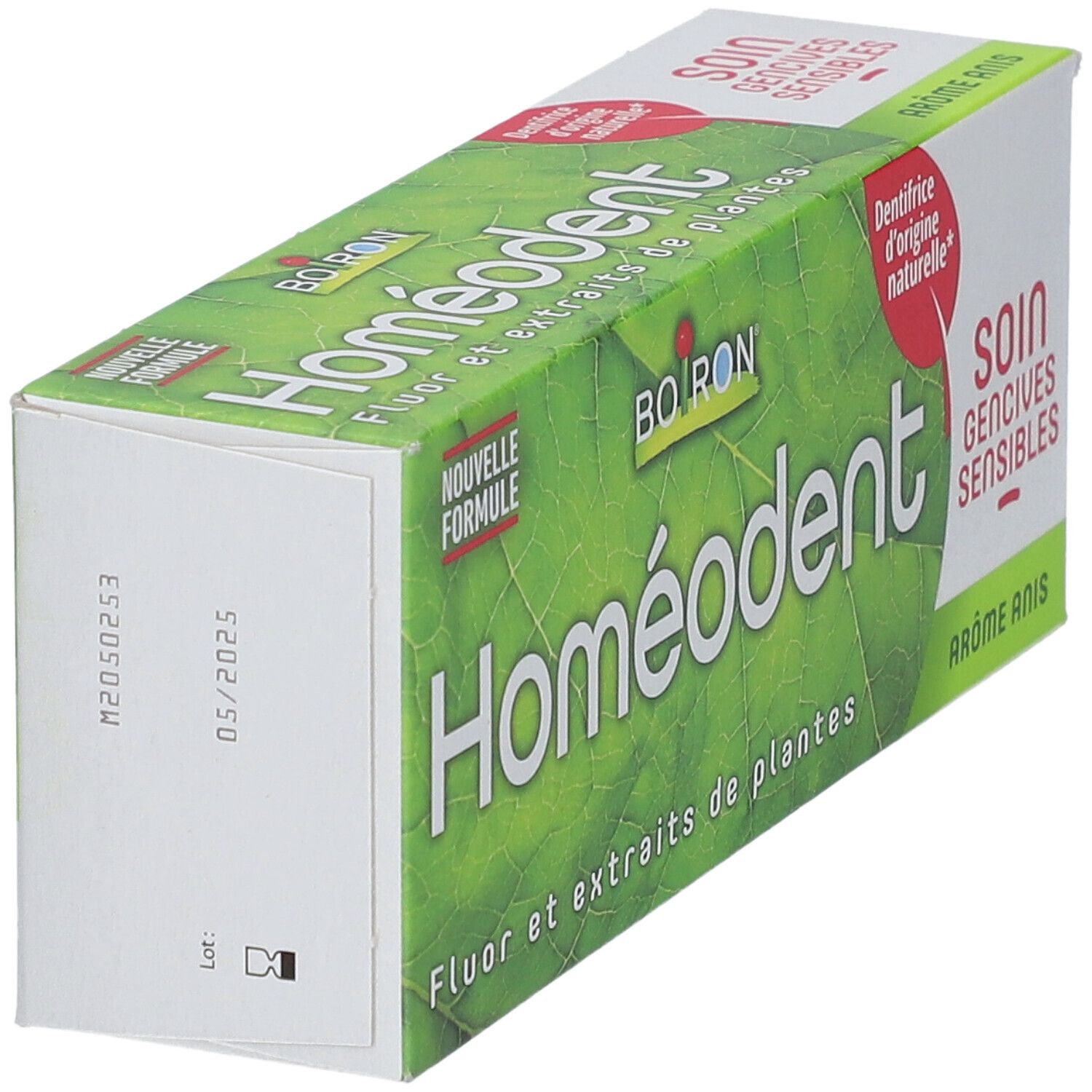 Zahncreme-Verpackung. Grün mit 'Homeodent' und 'Boiron' Logo. Text: 'Fluor et extraits de plantes'.
