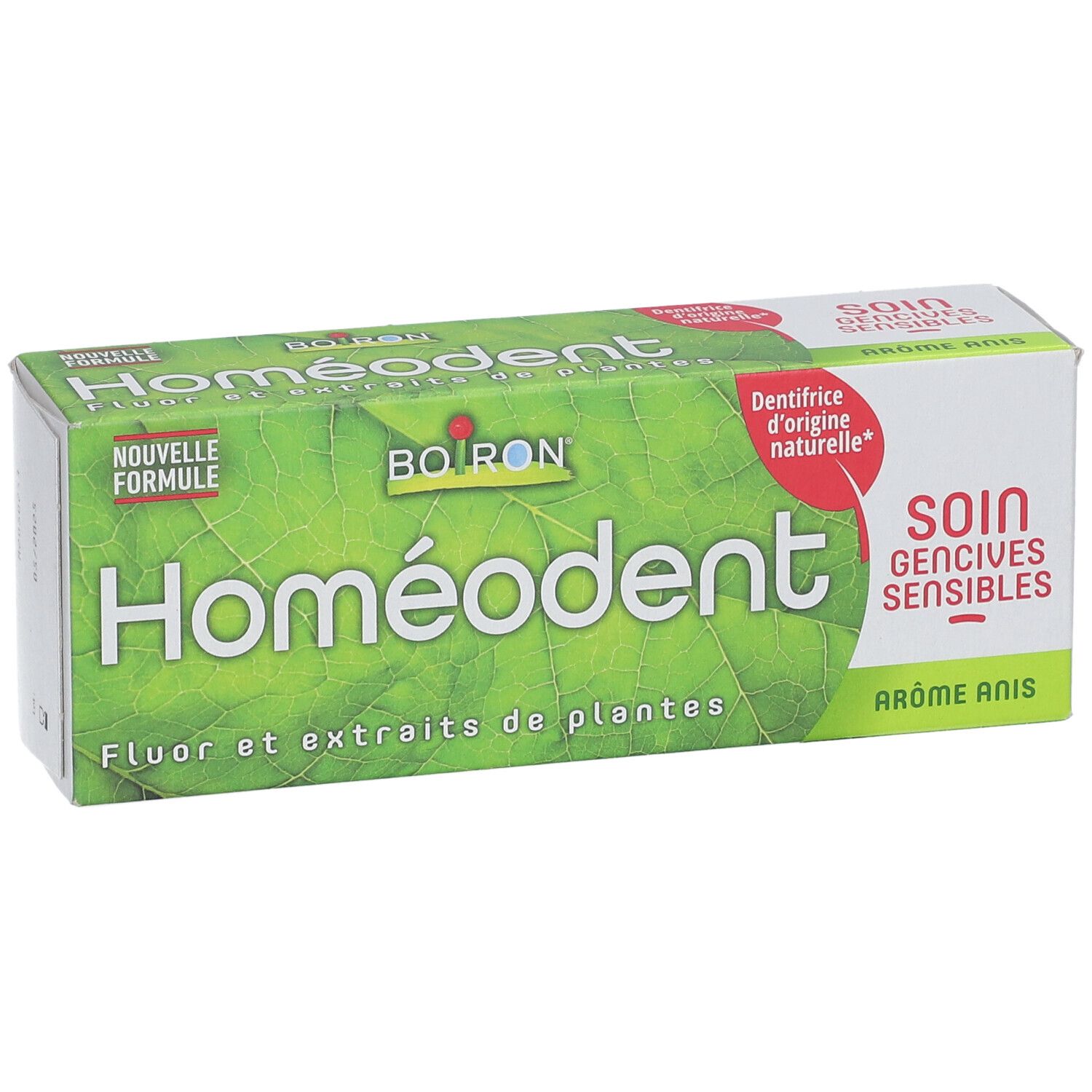 Zahncreme-Verpackung. Grün mit 'Homeodent' und 'Boiron' Logo. Text: 'Fluor et extraits de plantes'.