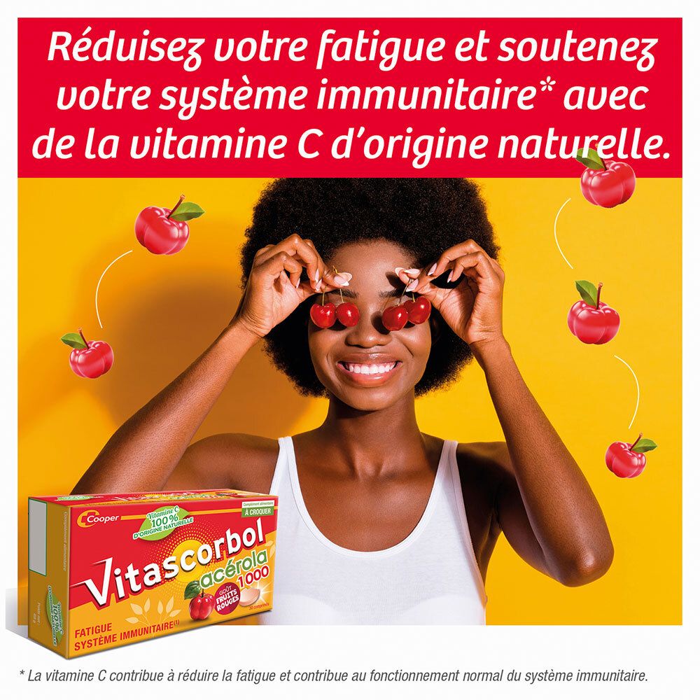 Trois comprimés. Texte: Vitamine C 100% naturelle. Goût fruits rouges. Flèches pointent vers les comprimés.