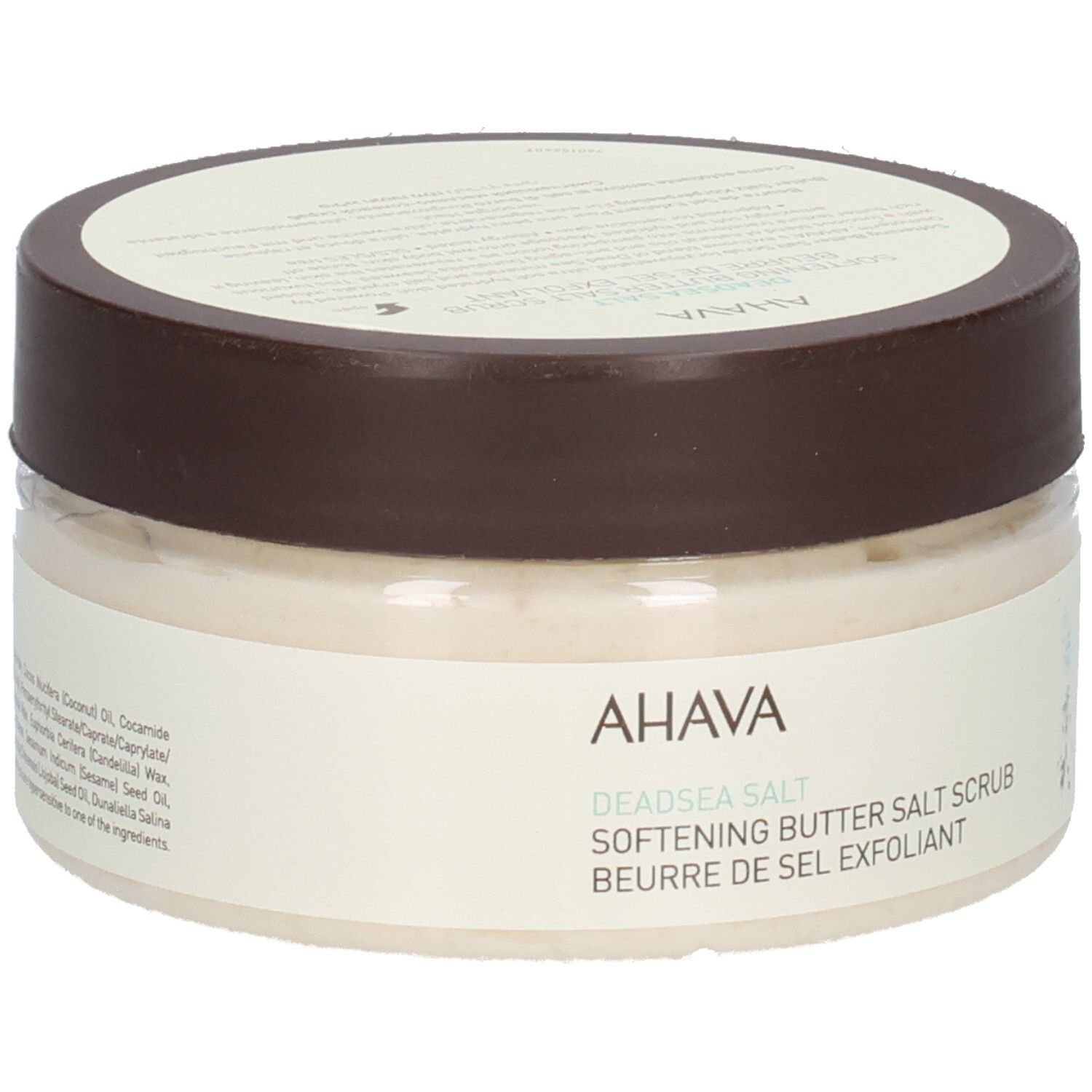 Ahava-Produkt. Rundes, transparentes Gefäß mit braunem Deckel. Aufschrift: AHAVA, Deadsea Salt, Softening Butter Salt Scrub, Beurre de Sel Exfoliant.