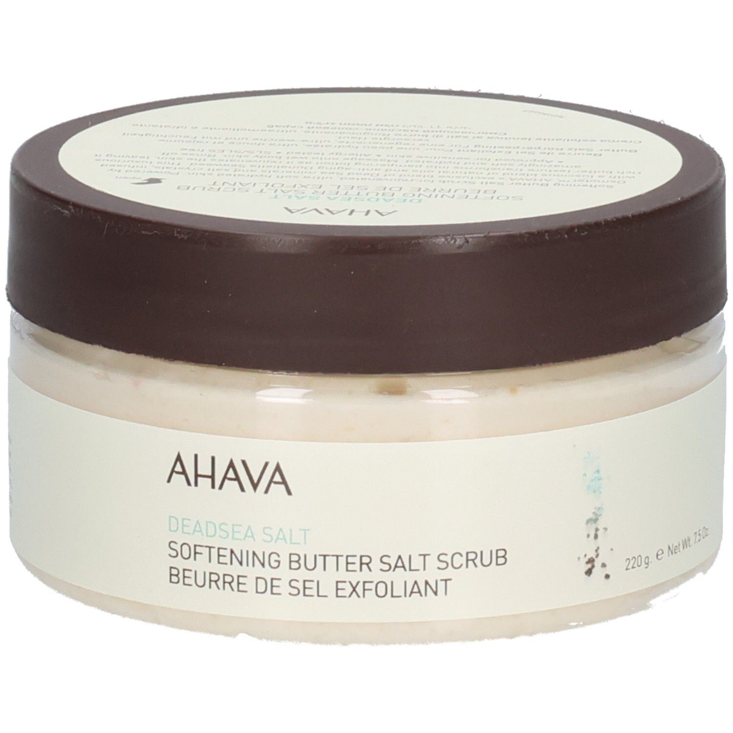 Ahava-Produkt. Rundes, transparentes Gefäß mit braunem Deckel. Aufschrift: AHAVA, Deadsea Salt, Softening Butter Salt Scrub, Beurre de Sel Exfoliant, 220g.