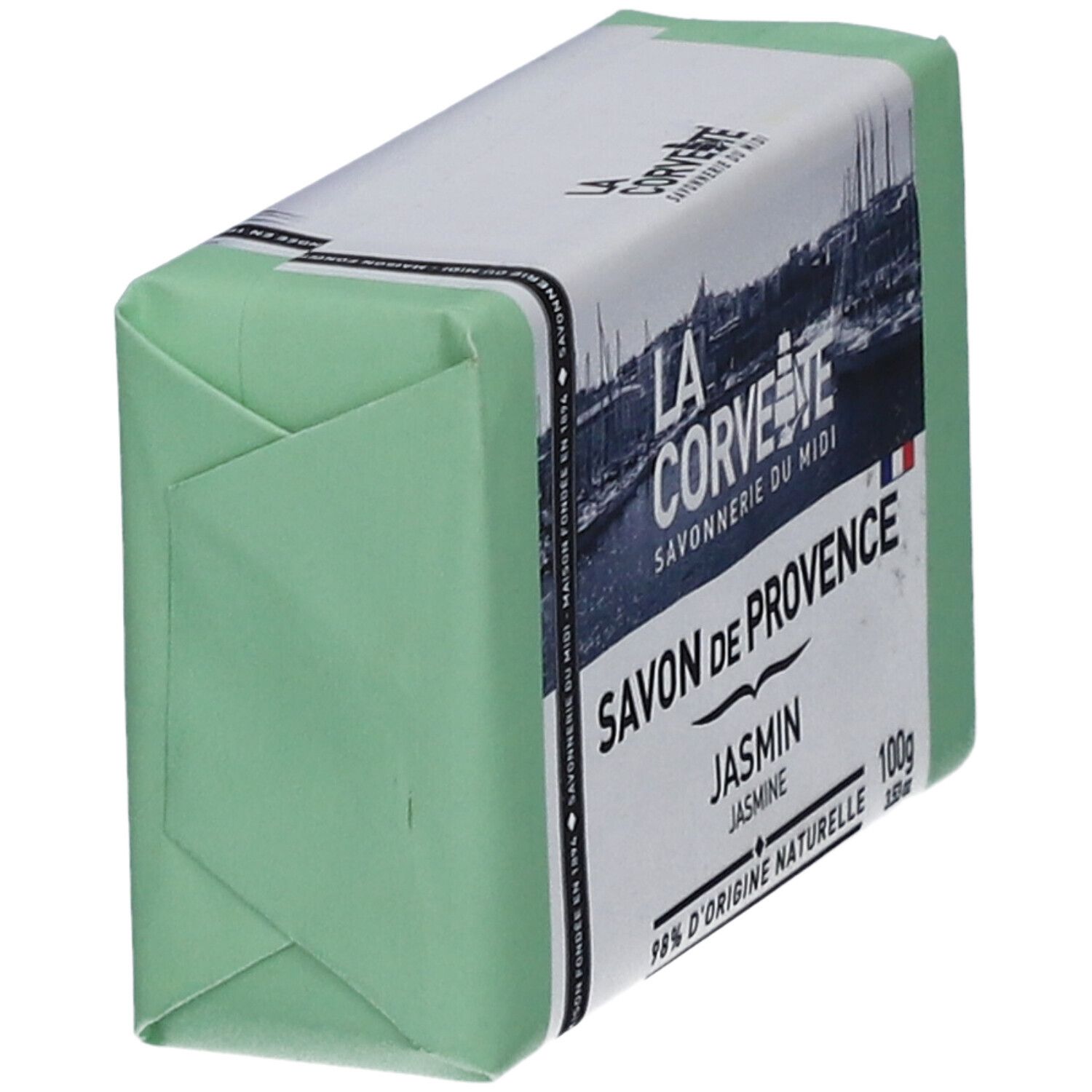 Grünes Seifenstück in Papierverpackung. Aufschrift: LA CORVETTE Savon de Provence Jasmin. Ansicht schräg von oben.