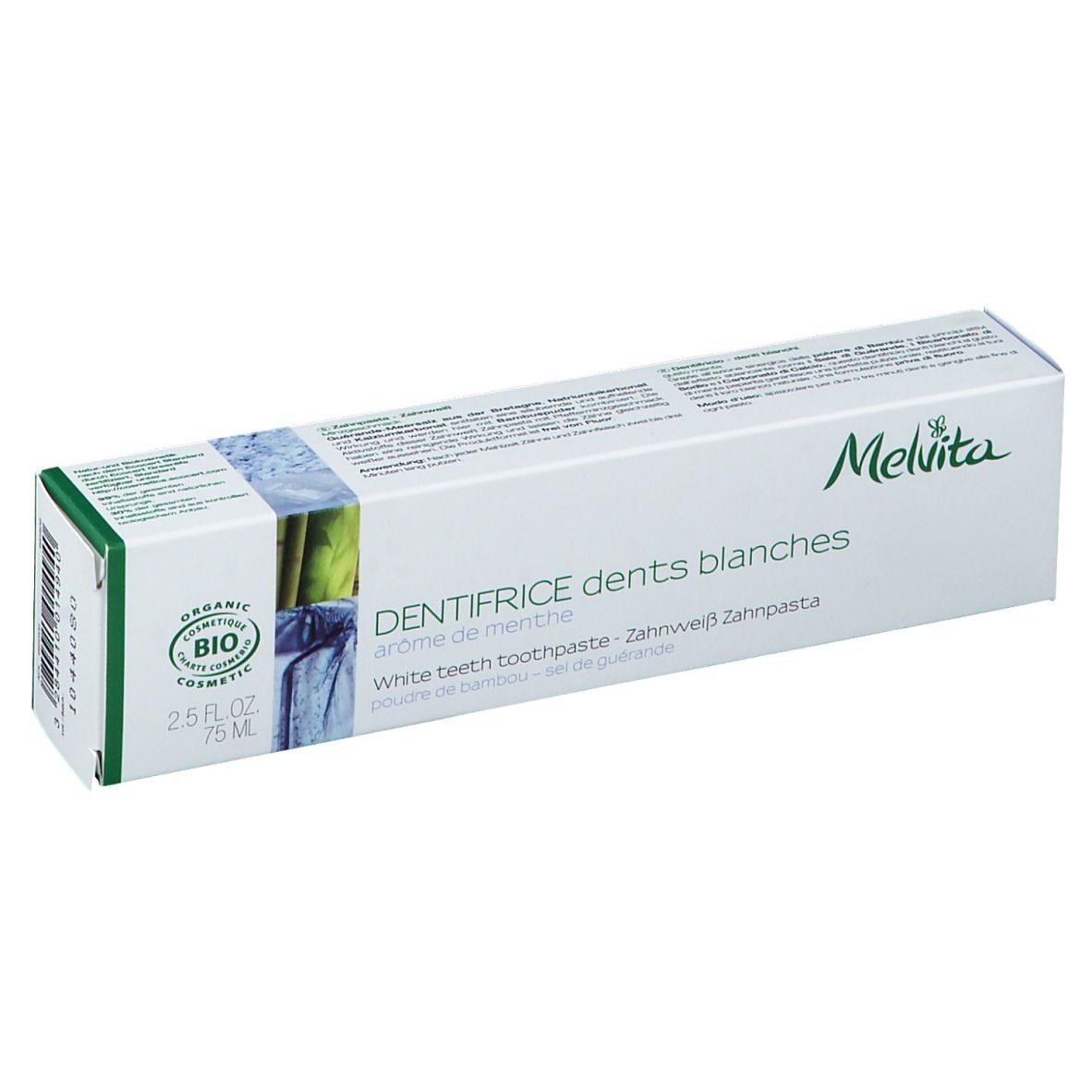 Emballage de dentifrice blanchissant. Boîte blanche avec accents verts. Logo Melvita et nom du produit.