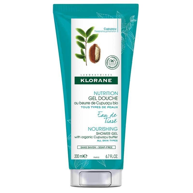 Türkisfarbene Tube mit KLORANE-Logo und Produktbezeichnung. Abbildung von Cupuaçu-Frucht und Blättern.