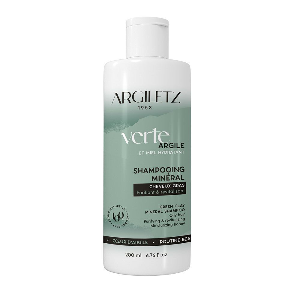 Flacon blanc et vert de shampooing. Inscriptions: Argiletz, Verte Argile, Shampooing Minéral. Pour cheveux gras. Au miel.