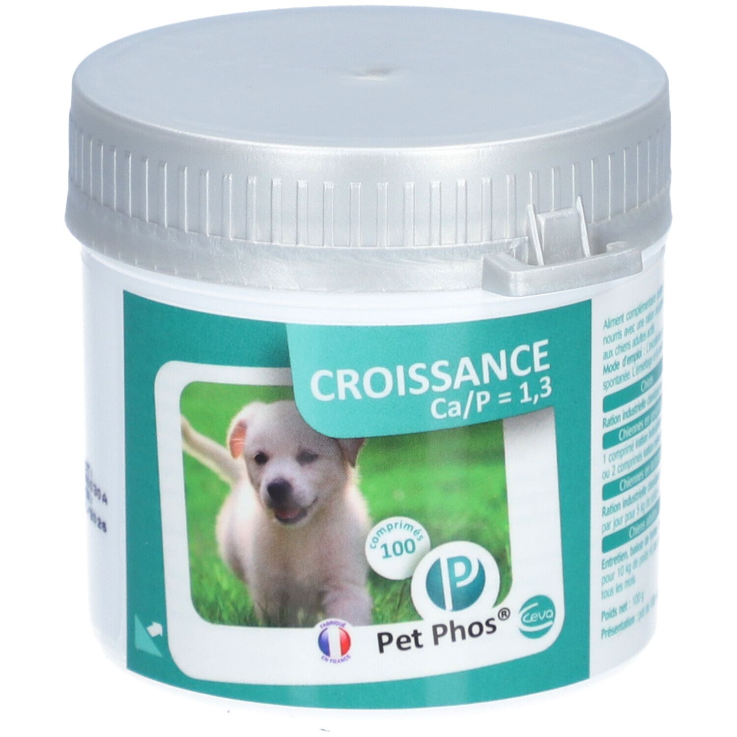 Boîte blanche, couvercle argenté. Étiquette : chiot, texte Croissance Ca/P = 1,3, Pet Phos, 100 comprimés.