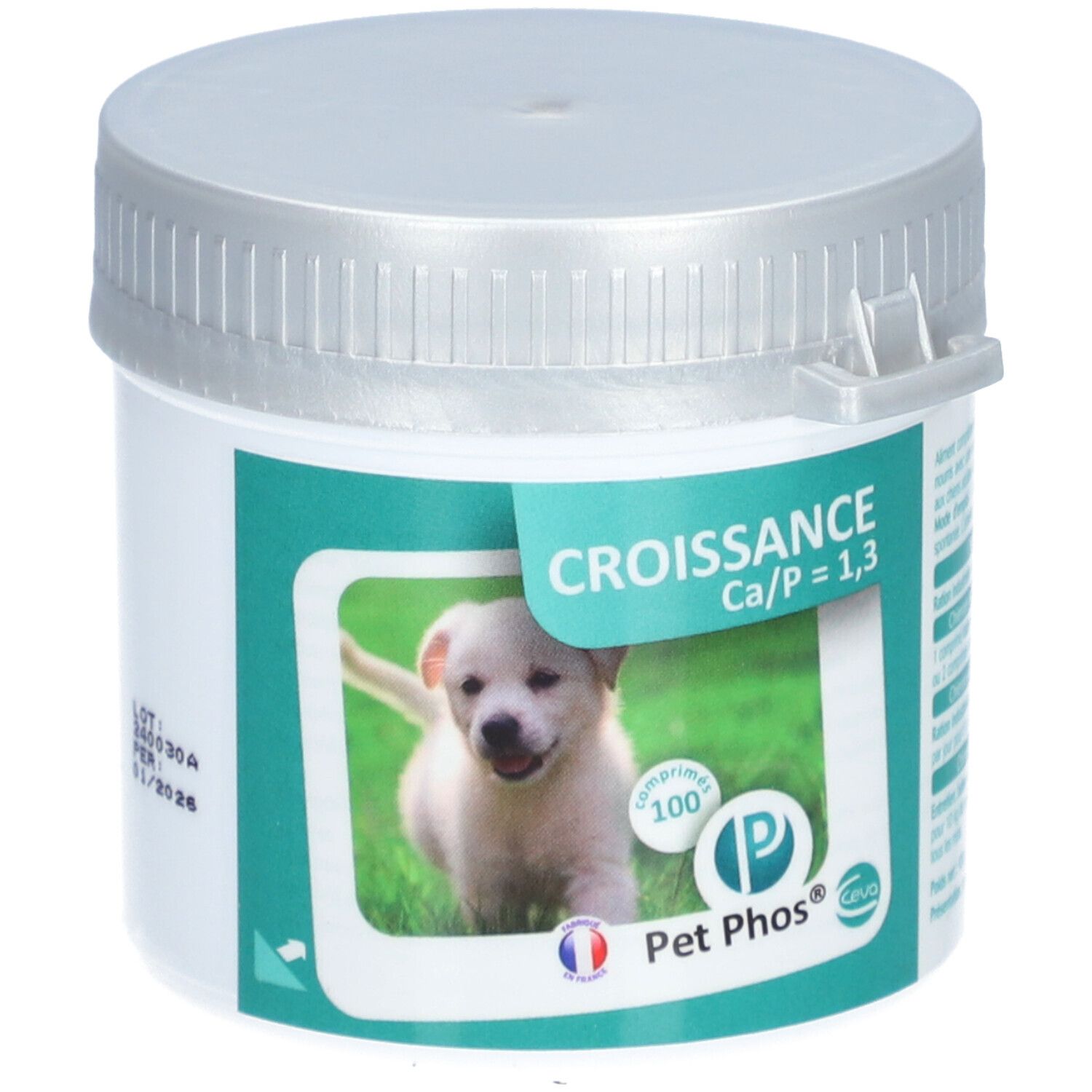 Boîte blanche, couvercle argenté. Étiquette : chiot, texte Croissance Ca/P = 1,3, Pet Phos, 100 comprimés.