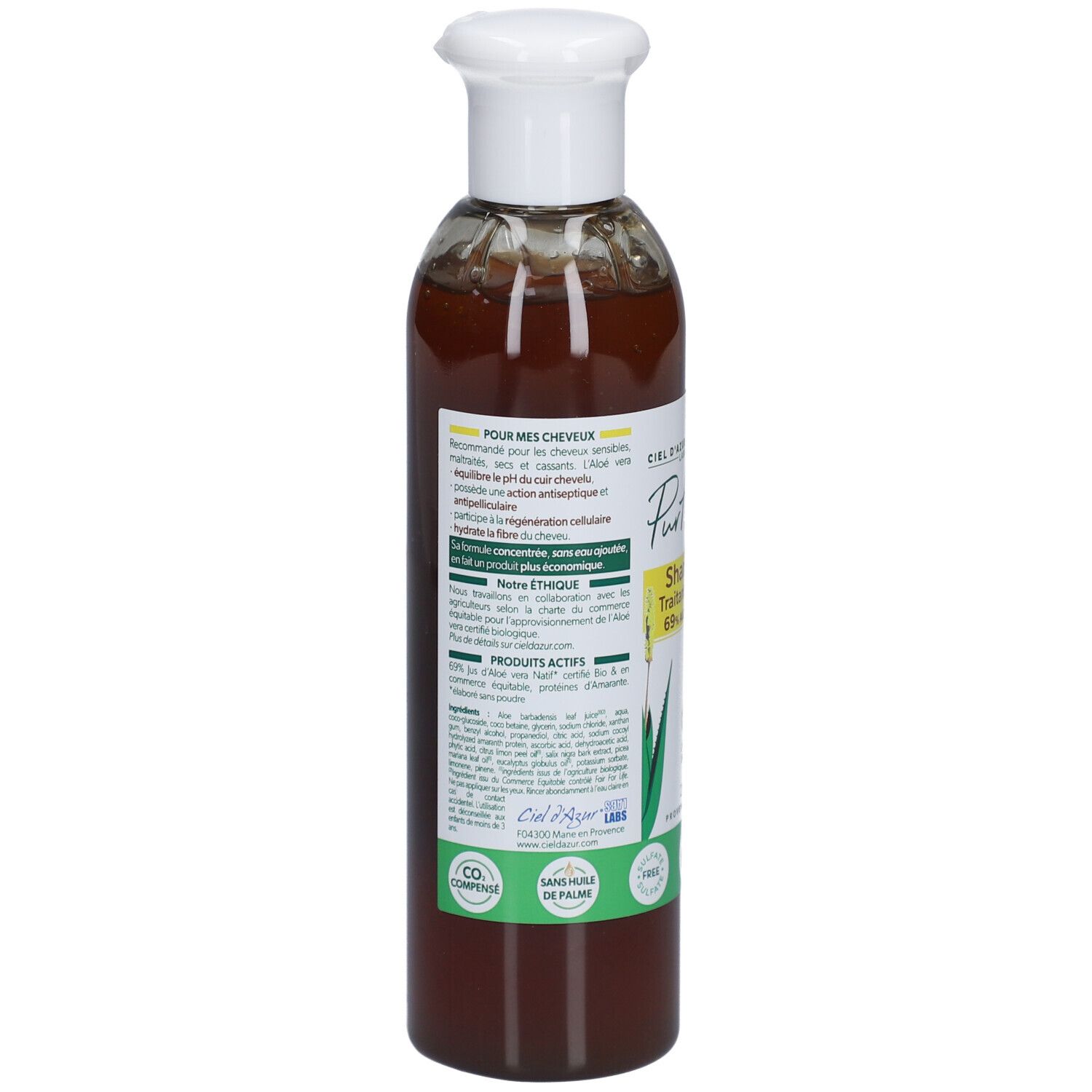 Rückseite der Flasche CIEL D'AZUR PurAloé Shampooing Concentré. Text und Logos auf weißem Etikett. Grüner Aufkleber mit Text.