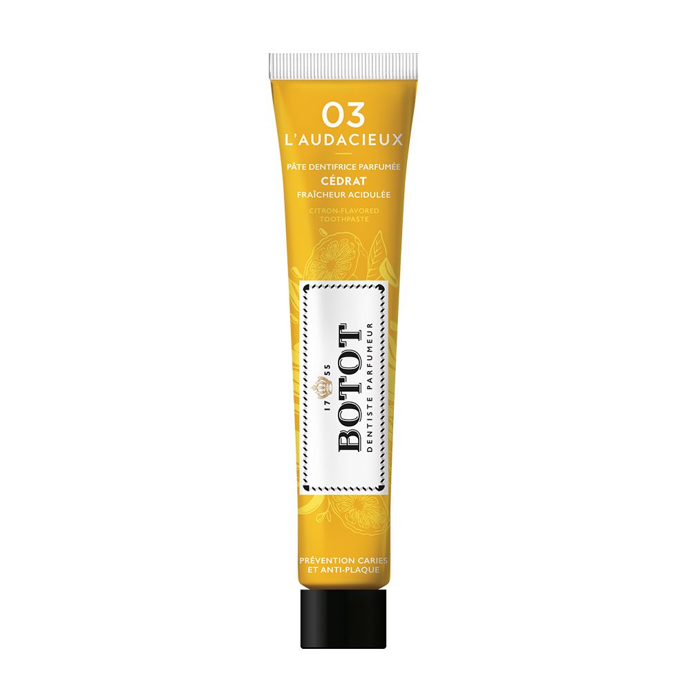 Zahncreme-Tube, weiß mit gelbem Akzent. Aufschrift BOTOT, Text in Französisch. Mit Schraubverschluss.