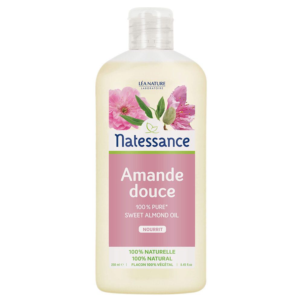 Flacon avec étiquette rose. Texte: Natessance, Amande douce, 100% pure Sweet Almond Oil. Décoration florale.