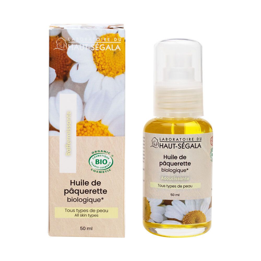 Flacon et emballage avec produit. Inscription: Huile de pâquerette biologique. Pour tous types de peau.