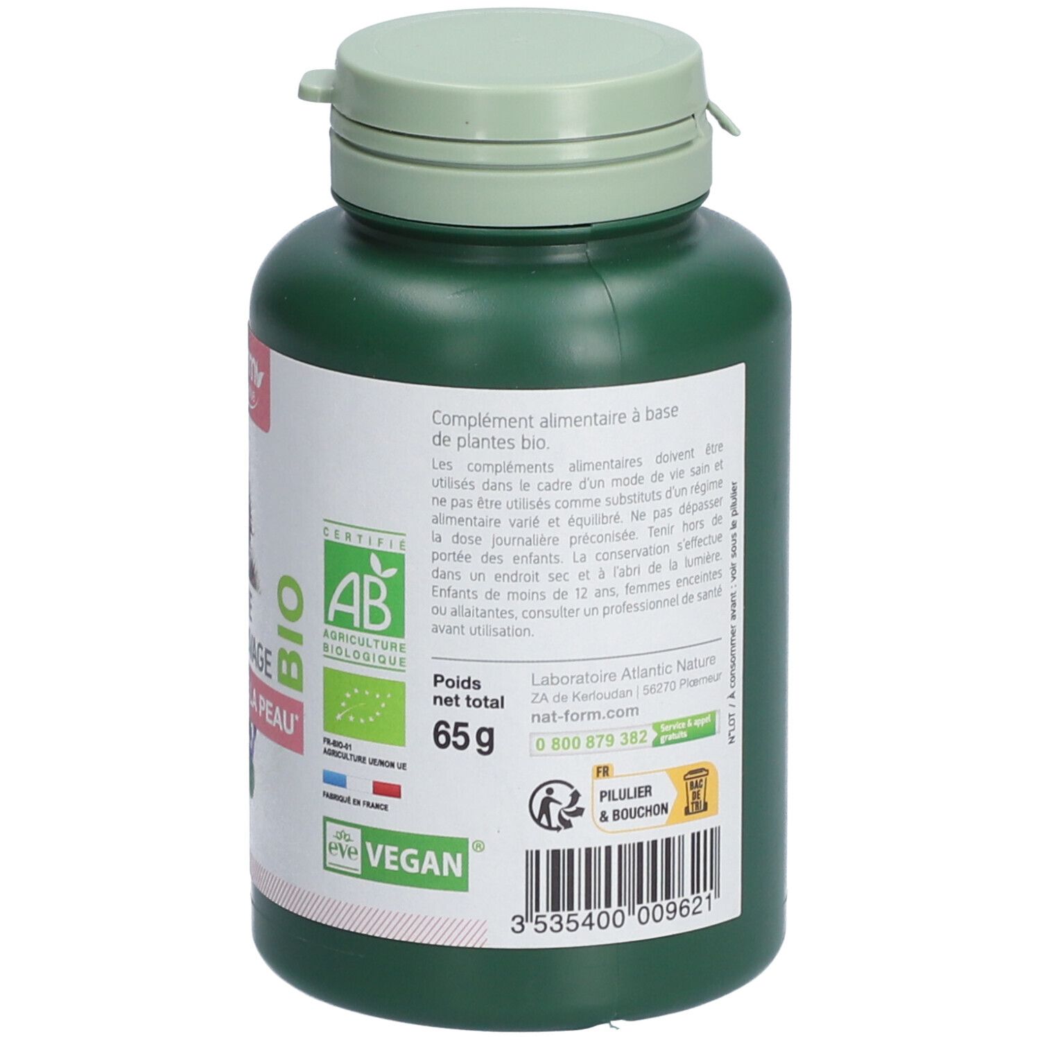 Rückseite einer grünen Flasche. Text: AB-Zertifizierung, Vegan, Nettogewicht 65g. Informationen zum Hersteller.