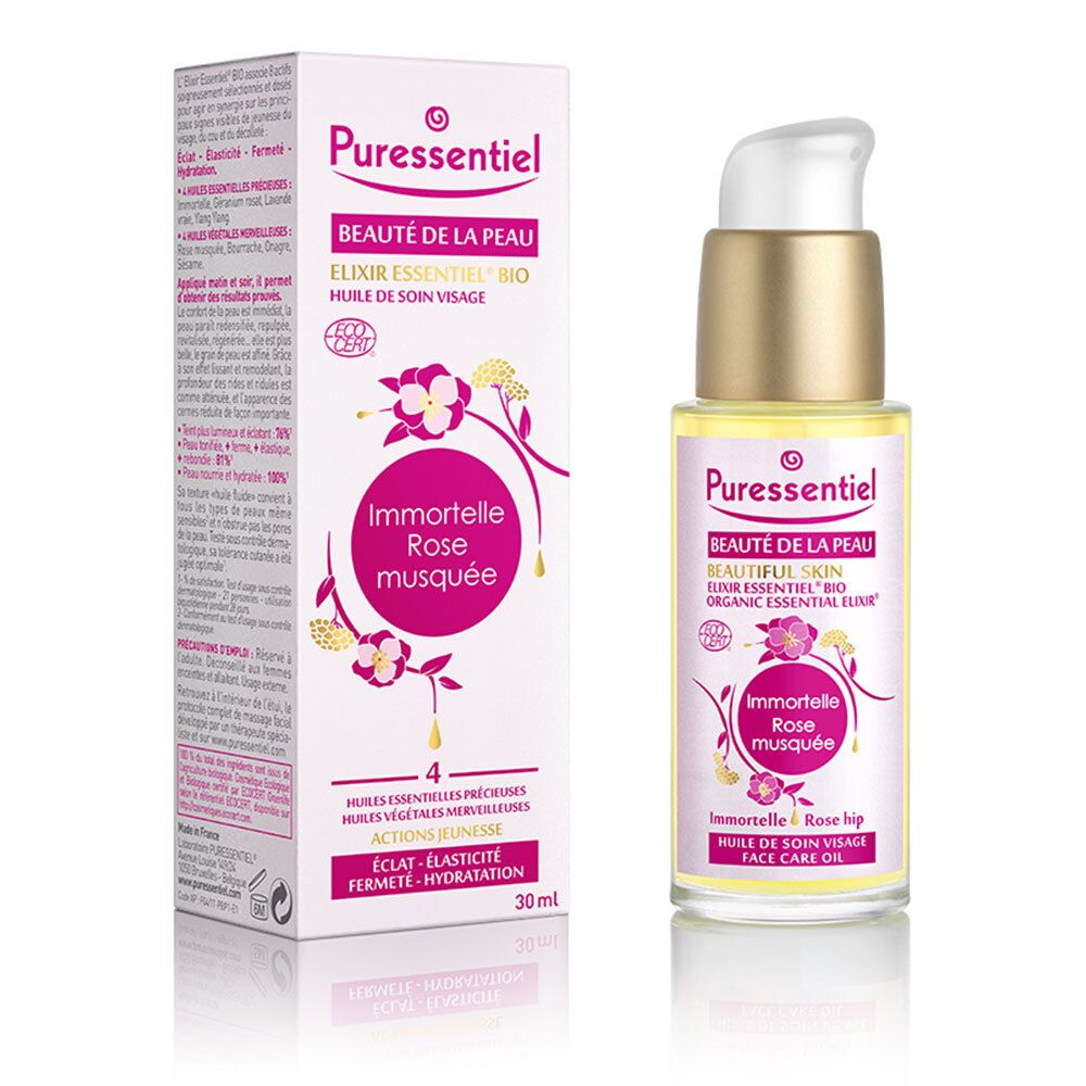 Emballage du produit et flacon d'huile pour le visage. Emballage avec nom du produit et motif floral.