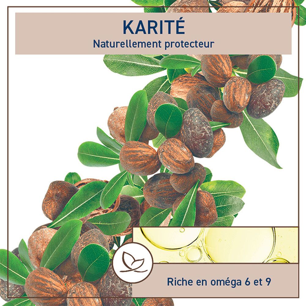Gros plan sur des noix et des feuilles. Texte: Karité, naturellement protecteur. Avec des gouttes d'huile.