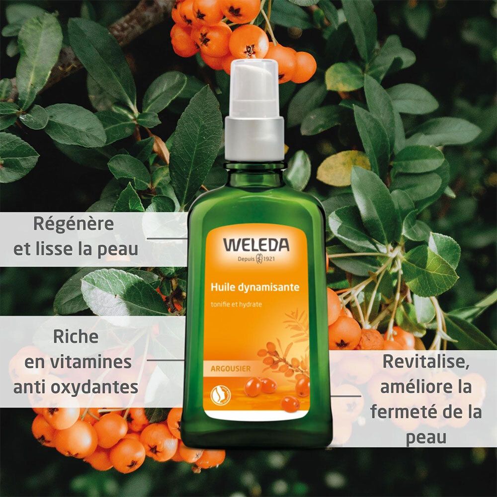 Flacon vert avec vaporisateur, entouré de feuilles et baies d'argousier. Nom du produit et logo WELEDA visibles.