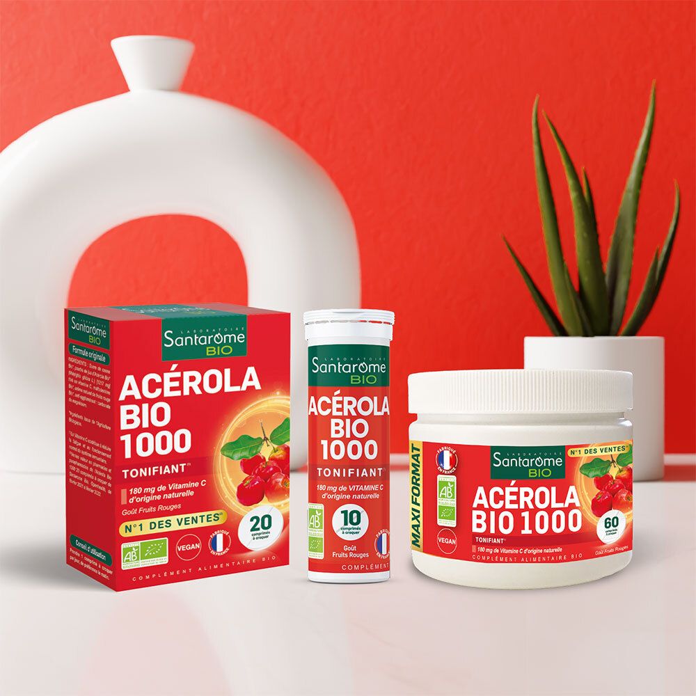 Drei Produktverpackungen: Schachtel, Tube, Dose. Text: ACÉROLA BIO 1000. AB-Bio-Siegel.