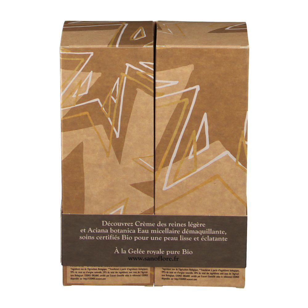 Geöffnete braune Geschenkverpackung mit weiß-goldenen geometrischen Mustern. Text: „Entdecken Sie Creme des reines légère...“