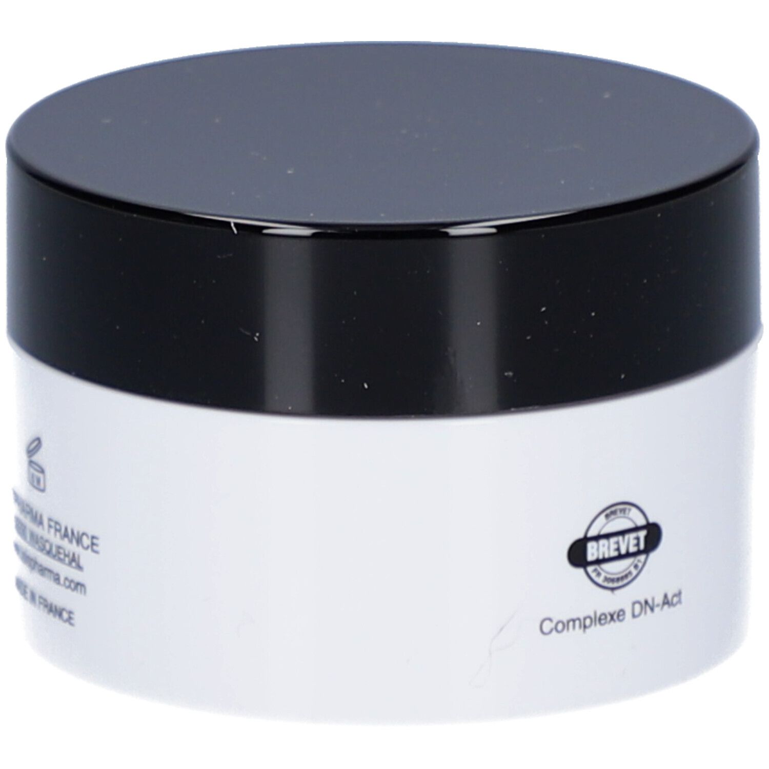 Pot de crème avec couvercle noir. Inscription: ISISPHARMA, BREVET, Complexe DN-Act.