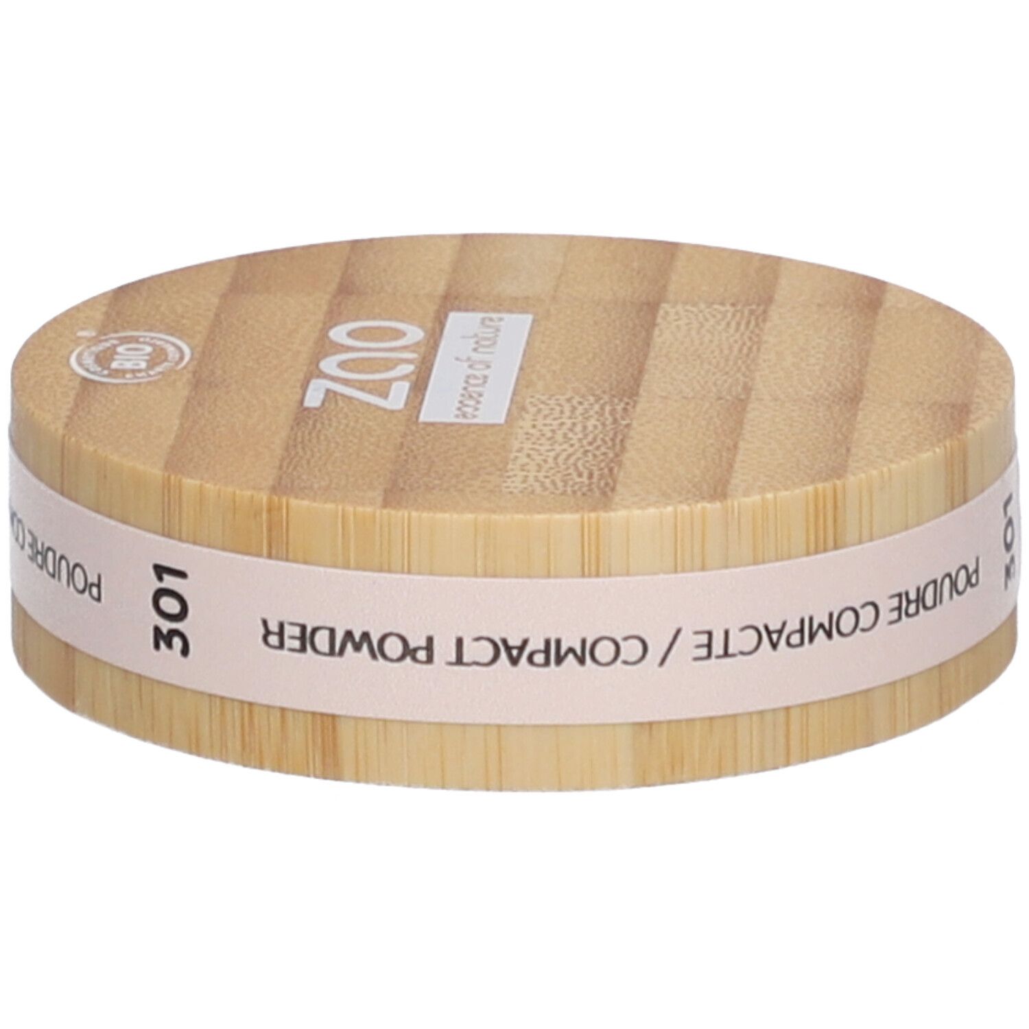 Kompaktpuder-Verpackung aus Holz. Aufschrift: ZAO, 301, Poudre Compacte/Compact Powder. Bio-Siegel.