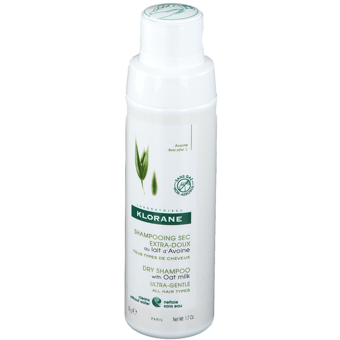 KLORANE Trockenshampoo mit Hafermilch. Weiße Flasche mit grünem Etikett. Text und Logo.