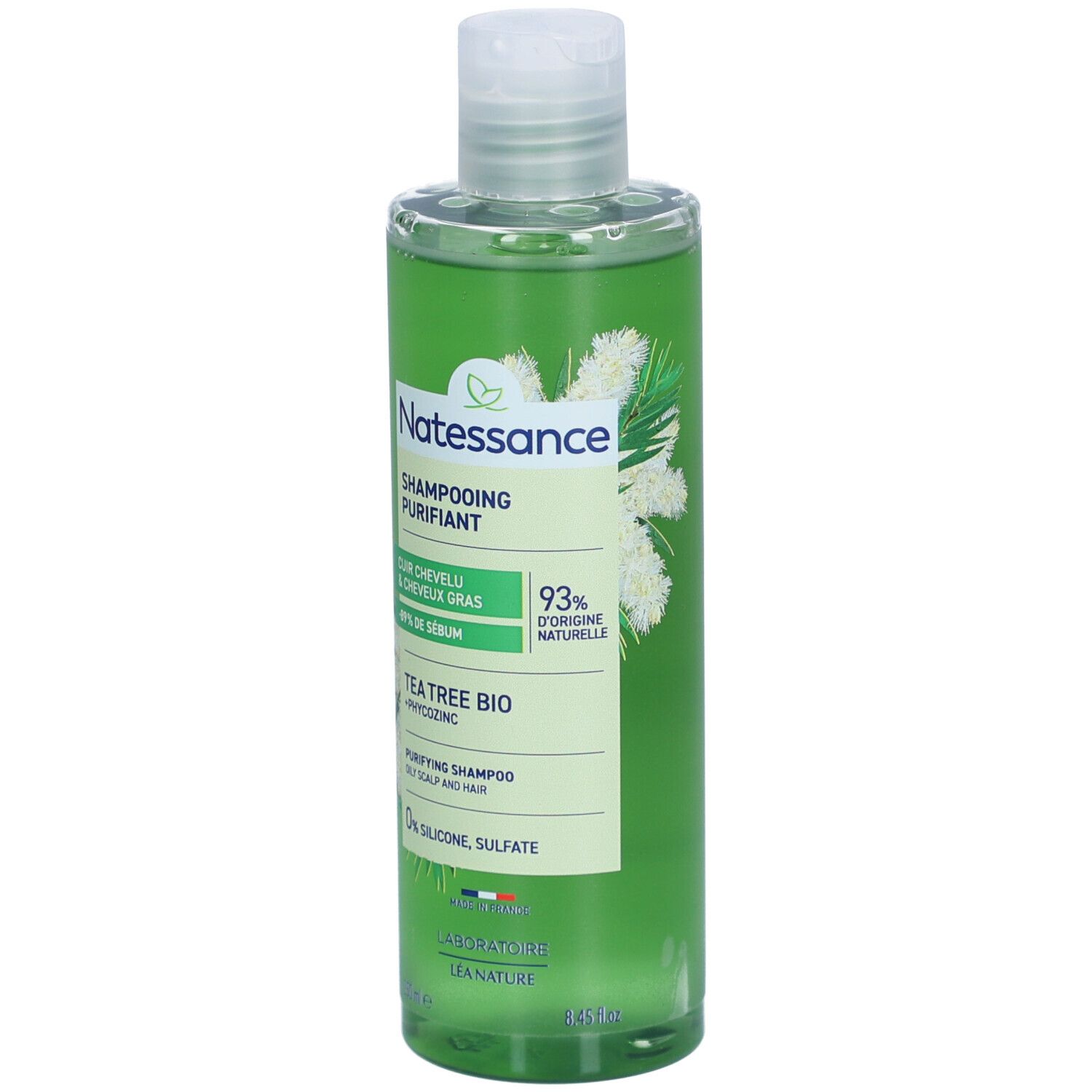 Grüne Shampoo-Flasche. Aufschrift: Natessance, Shampoing Purifiant, Tea Tree Bio. 93% natürliche Inhaltsstoffe. 0% Silikon, Sulfate.