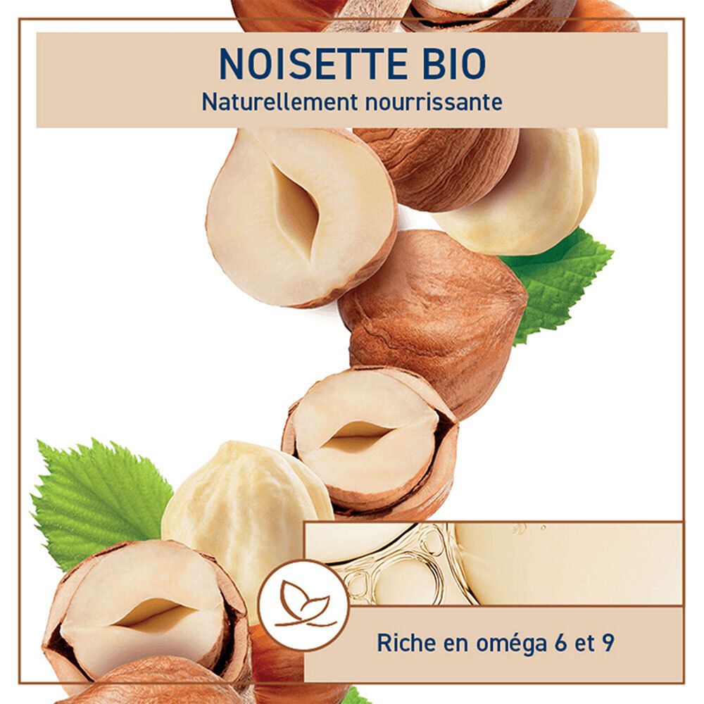 Gros plan sur des noisettes et des feuilles. Texte : Noisette Bio, naturellement nourrissante, riche en oméga 6 et 9.