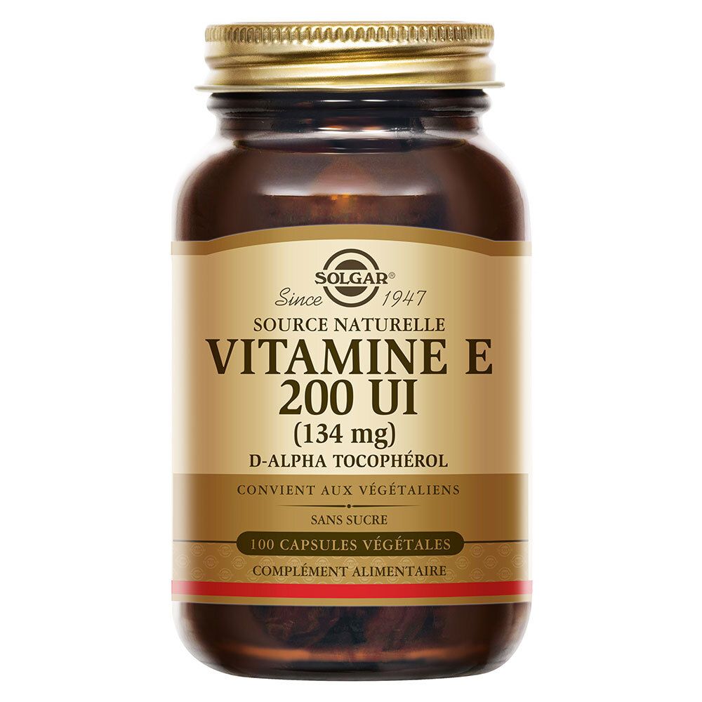 Flacon en verre brun, bouchon doré. Étiquette: Vitamine E 200 UI (134 mg), D-alpha-tocophérol. Convient aux végétaliens.