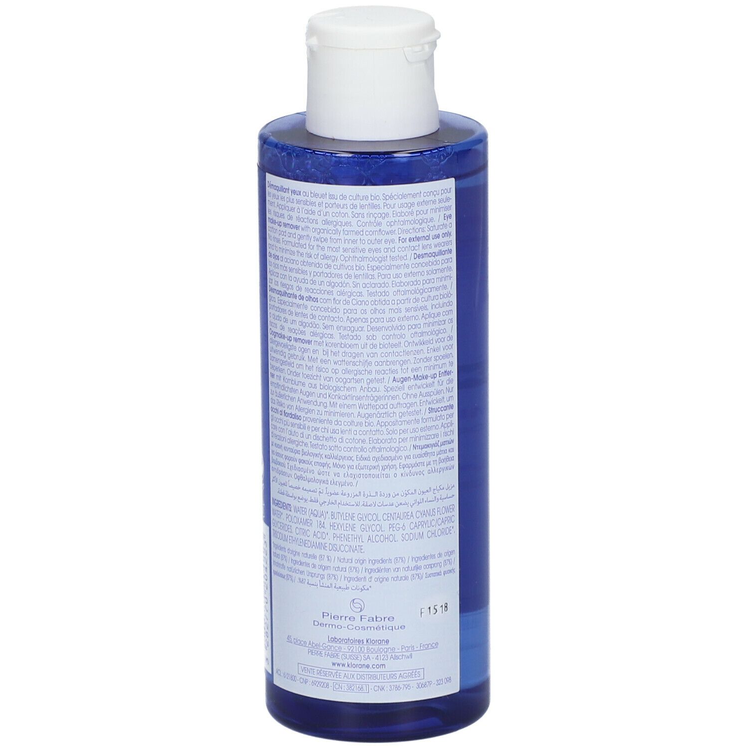 Dos du flacon bleu. Texte avec ingrédients et informations fabricant. Bouchon blanc.