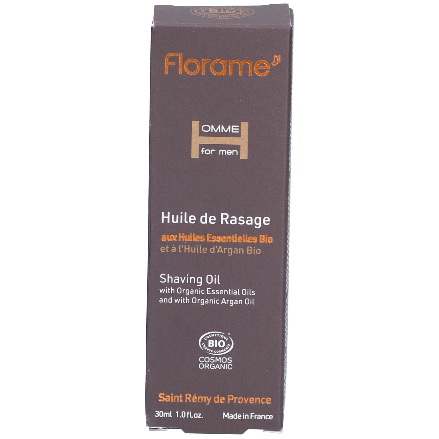 Braune Verpackung mit Text und Logo. Enthält Rasieröl. Weißer Text auf braunem Hintergrund.