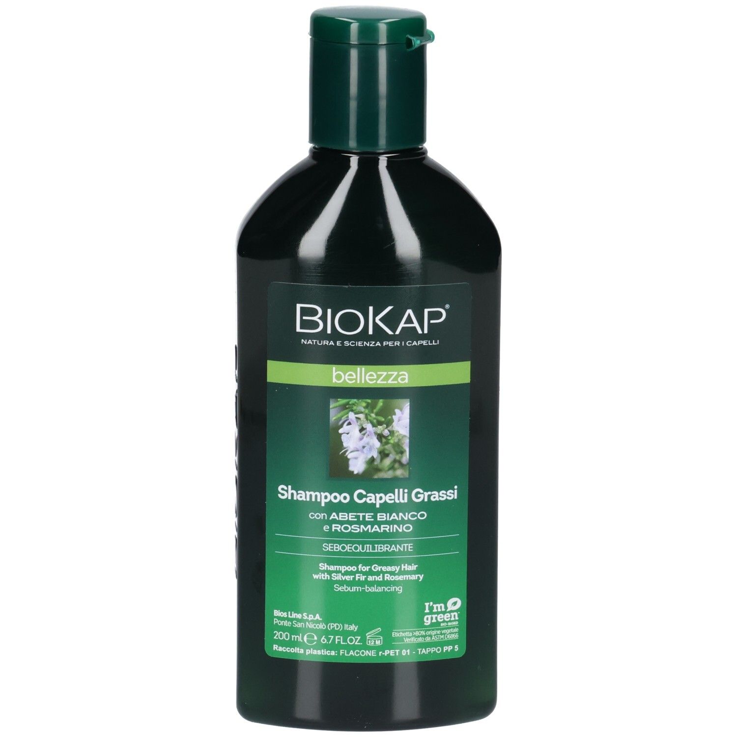 Grüne Flasche mit Shampoo. Aufschrift BIOKAP, bellezza, Shampoo Capelli Grassi. Mit weißer Tanne und Rosmarin. 200 ml.