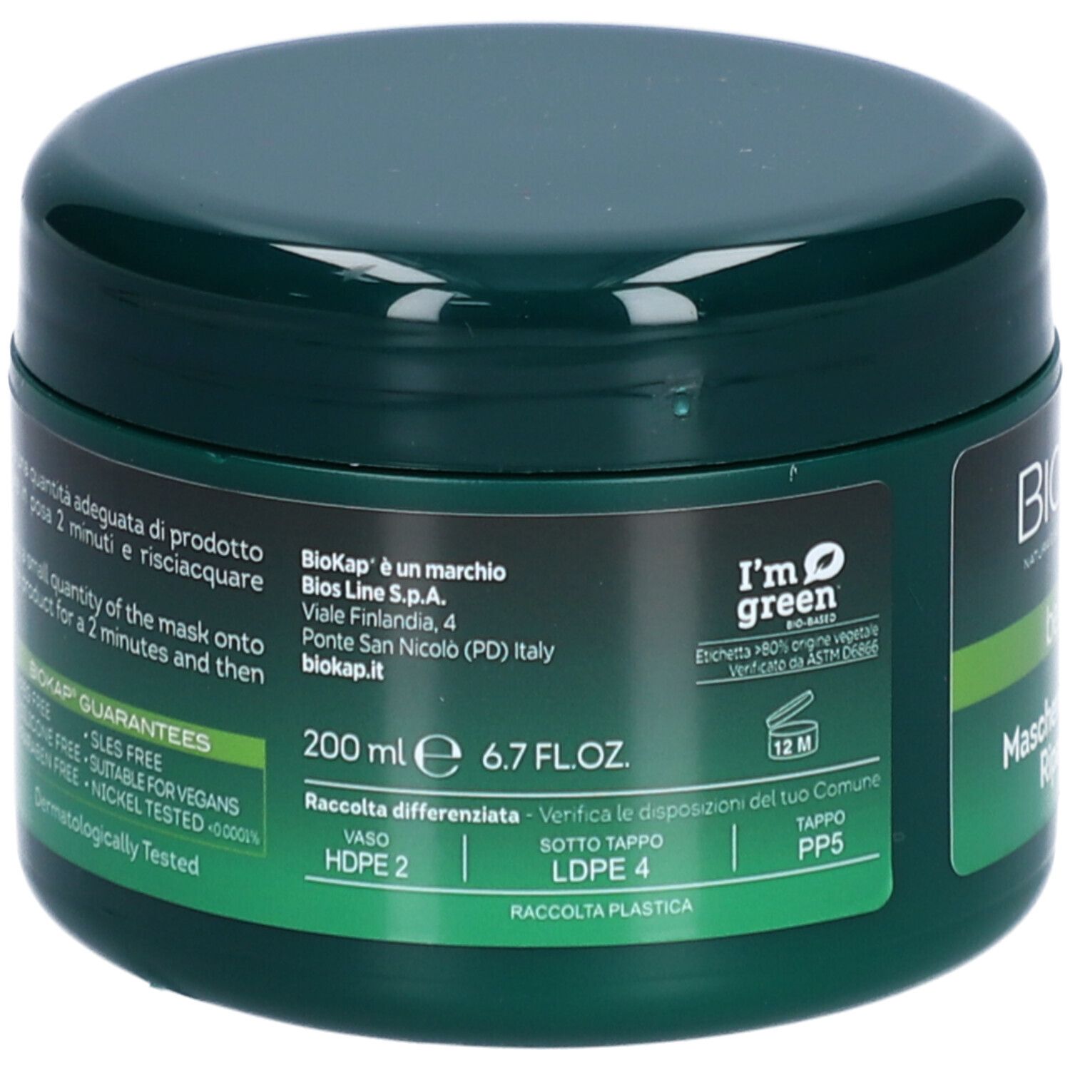 Grüner Tiegel mit Text. Aufschrift: BIOKAP. Enthält Haarmaske. Text: 200 ml 6.7 FL.OZ. und Informationen zur Herstellung.