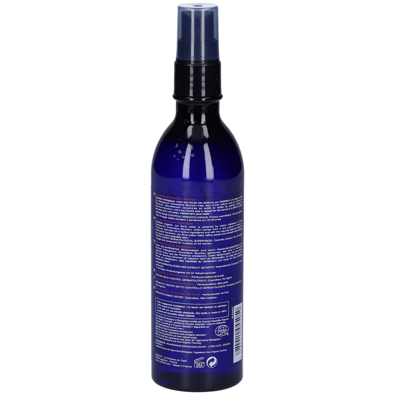 Flacon bleu avec texte. Inscription Melvita, Eau florale de Géranium Bourbon, certification Bio. Texte multilingue.