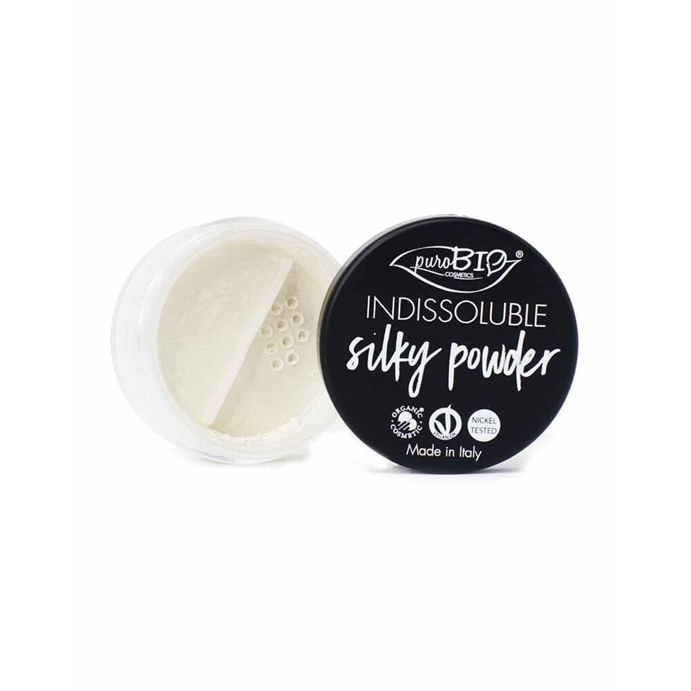 Boîte ronde noire avec poudre blanche. Couvercle avec inscription: Indissoluble silky powder. Sceaux et inscription: Made in Italy.