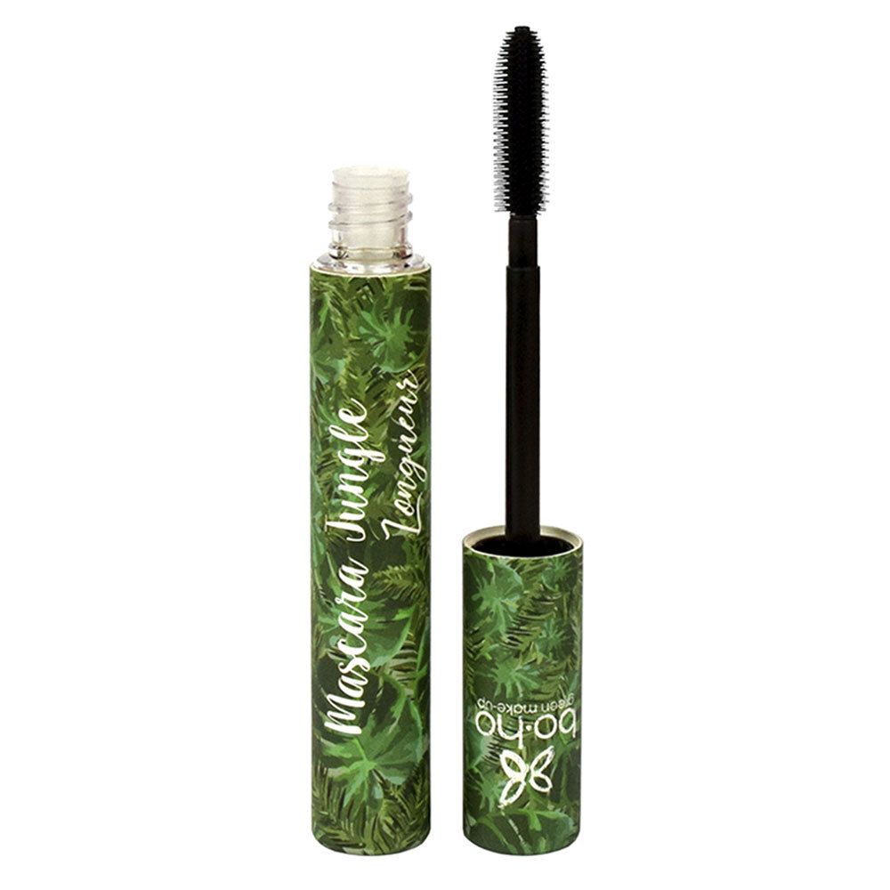 Mascara-Tube mit Bürste. Grün-bedruckte Verpackung mit Produktnamen. Bürste schwarz.