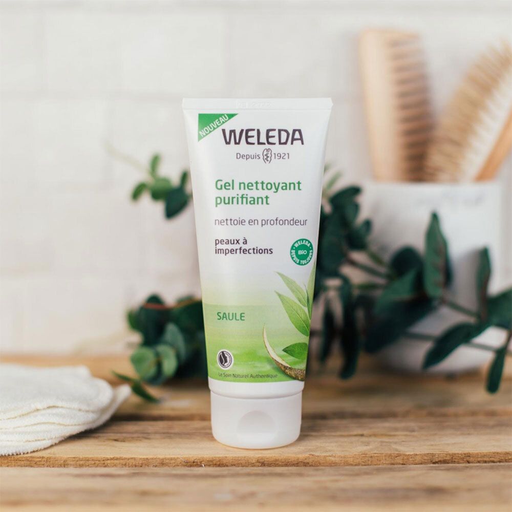 Gel nettoyant purifiant Weleda, tube sur bois. Texte: nettoie en profondeur, peaux à imperfections, saule.