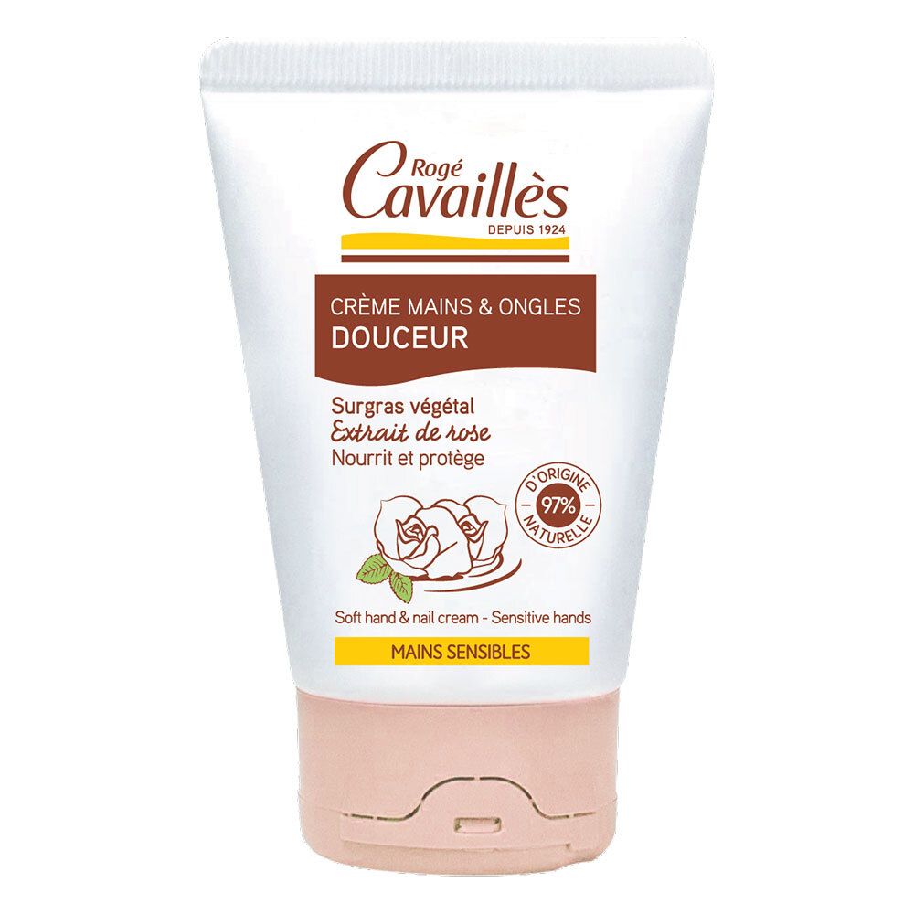 Rogé Cavaillès Zarte Handcreme. Weiße Tube mit braunen und rosa Akzenten. Text: Crème Mains & Ongles Douceur, 97% natürliche Inhaltsstoffe.