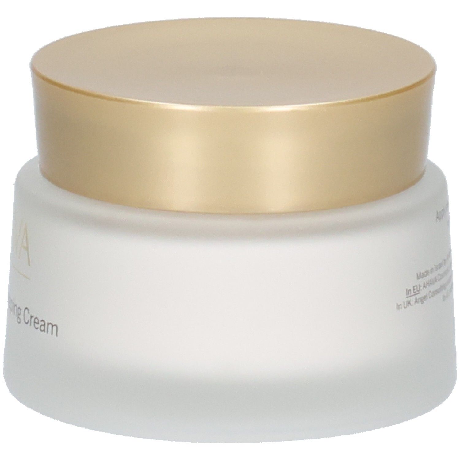 Cremebehälter mit goldenem Deckel. Aufschrift AHAVA und Brightening Sleeping Cream. Weißes, mattiertes Glas.